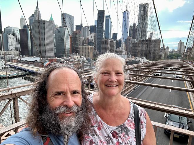 Selfie with view from Brooklyn Bridge