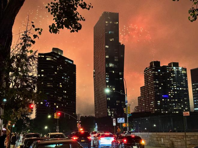 Fireworks behind building