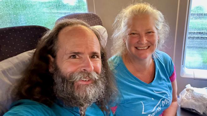 Karen and Greg in train seats