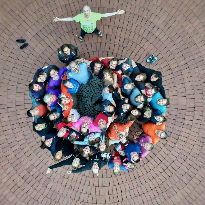 A circle of people from above