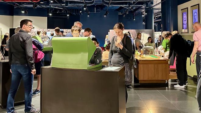 the inside of a crowded museum