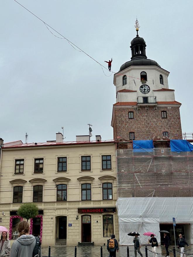 &ldquo;a man on a highline strung from a tower&rdquo;