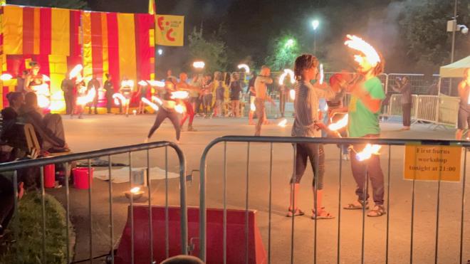 &ldquo;many people juggling and swinging fire&rdquo;