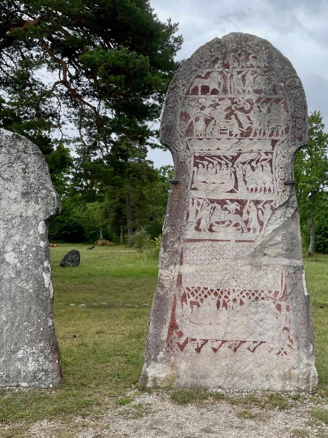 &ldquo;a flat upright stone with many rows of paintings&rdquo;